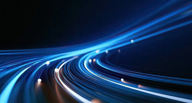 Streaks of bright blue and white light curve across a dark background