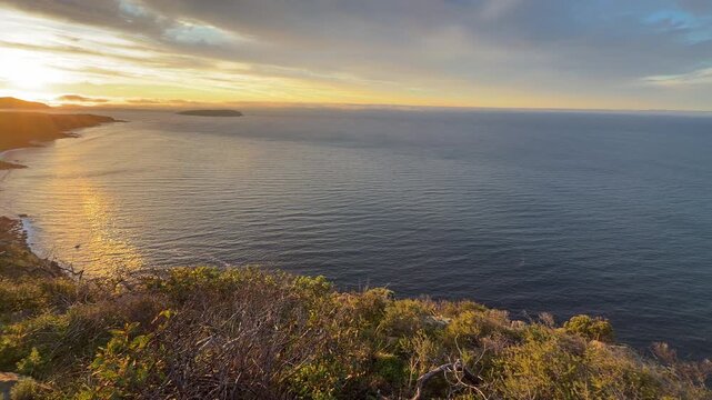 Spectacular sunrise panning over the Waitpinga cliffs and ocean in South Australia in 4k footage