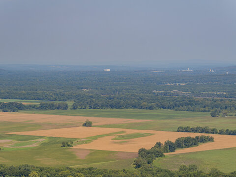Aerial view of rolling hills and farmland in Petit Jean State Park