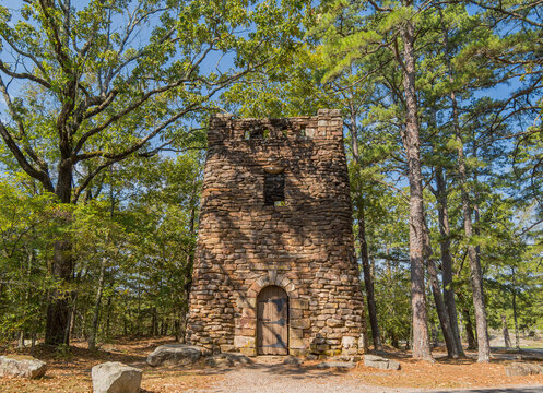 Stone water tower in forest