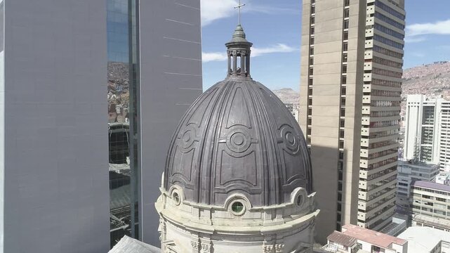 Top aerial view of cathedral dome and cross in La Paz, Bolivia