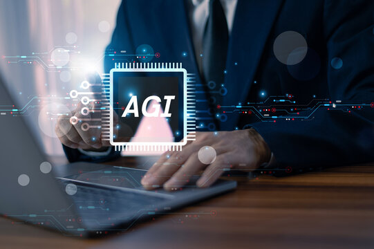Man Using AGI Technology on computer laptop for Innovation, Research, and Future Business Solutions.