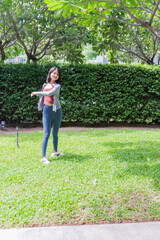Fototapeta premium Asian sport woman stretching in park