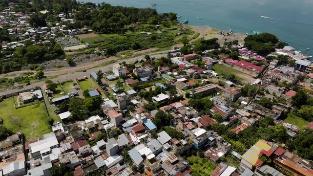 Panoramic aerial view of a coastal town in Guatemala highlands at Lake Atitlan