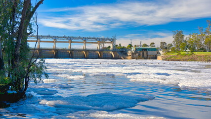 Murray River foam drifts downstream from Mulwala weir © Alistair