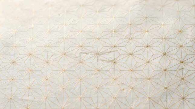 Geometric star pattern with gold lines on textured paper
