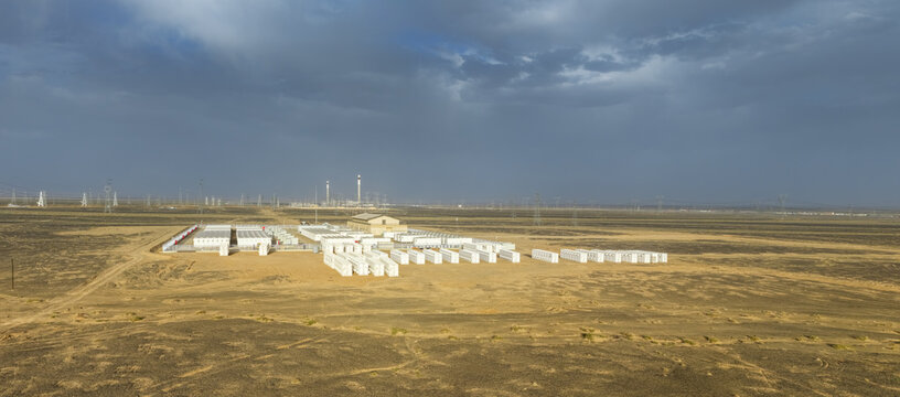 Massive Battery Energy Storage Power Station under Dramatic Twilight Sky in Desert Wilderness