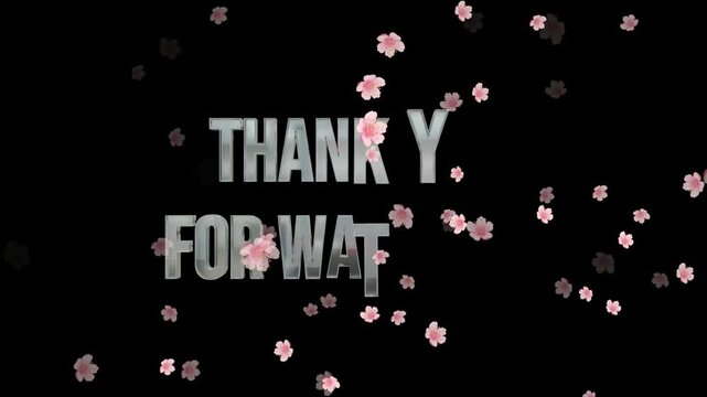 A video thank you message with falling flowers on a black background