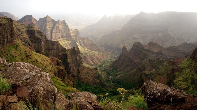echoing. Sound waves echoing between canyon walls in a misty valley, wide landscape view. travel magazines, destination branding, designed for outdoor magazines and nature guides.