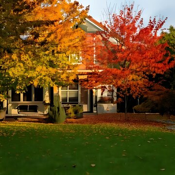Beautiful autumn scenery with a house surrounded by colorful trees.