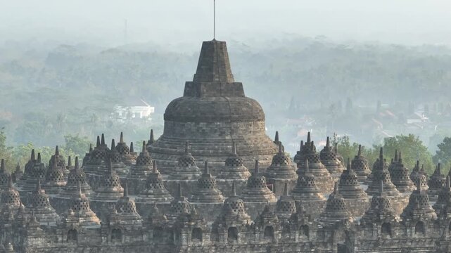 Aerial view of Borobudur Temple in Yogyakarta, Java, Indonesia at sunrise.