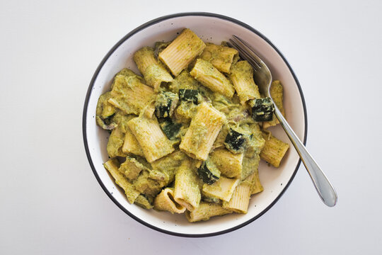 creamy zucchini rigatoni pasta with vegetables for a healthy vegetarian meal