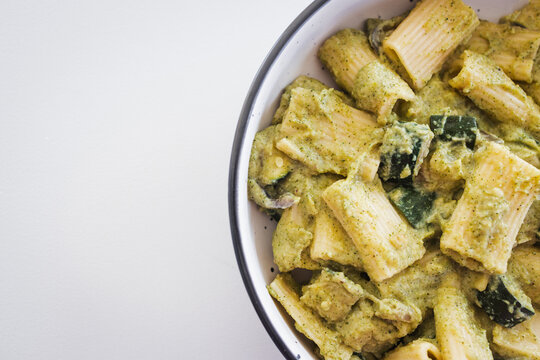 creamy zucchini rigatoni pasta with vegetables for a healthy vegetarian meal