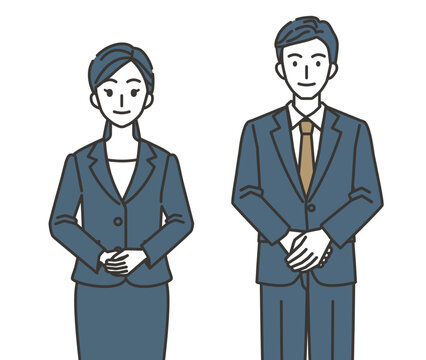 上品で丁寧な接客をするスーツ姿の男女