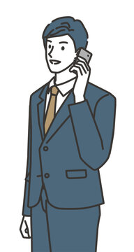 スマートフォンで取引先と話すビジネスマン