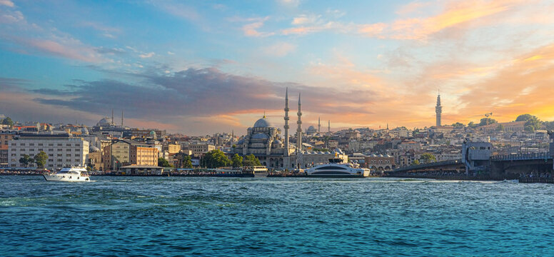 Istanbul cityscape with yeni cami mosque at sunset