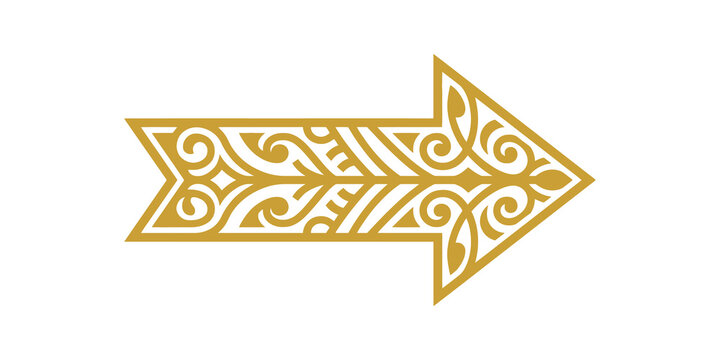 Golden ornamental arrow pointing right with intricate floral design.