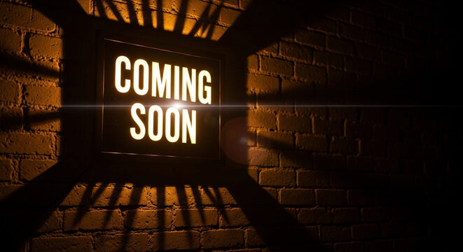 Coming soon glowing lightbox on brick wall, illuminated announcement sign with light rays, cinematic marketing teaser display