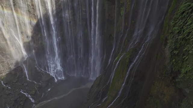 Aerial view of the natural landscape of Tumpak Sewu Waterfall in Java, Indonesia