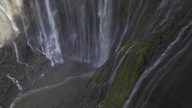 Aerial view of the natural landscape of Tumpak Sewu Waterfall in Java, Indonesia