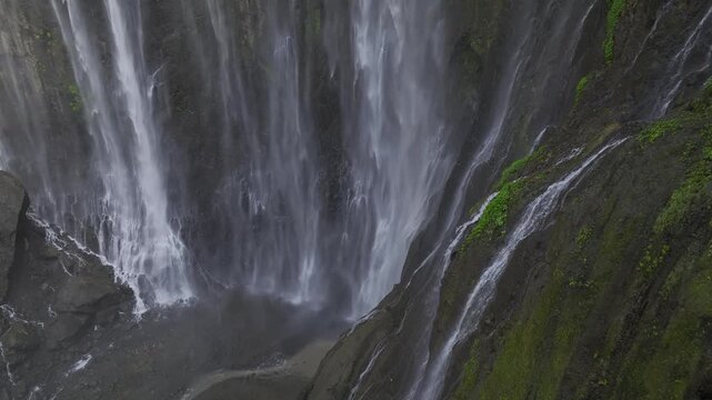 Aerial view of the natural landscape of Tumpak Sewu Waterfall in Java, Indonesia