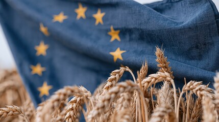 Obraz premium The EU flag fluttering beside a golden wheat field under a clear sky