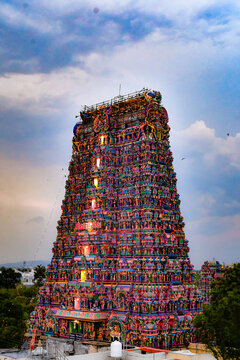 Detailed view of the richly sculpted gopuram of Madurai Meenakshi Amman Temple during preparations ahead of the Thirukkudamuzuku, a sacred Hindu Kumbabhishekam consecration ceremony