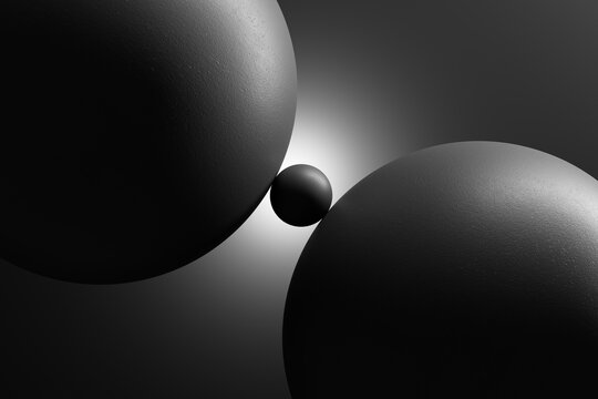 Small black sphere connecting two large spheres, representing connection, mediator, balance, bridge, and contact
