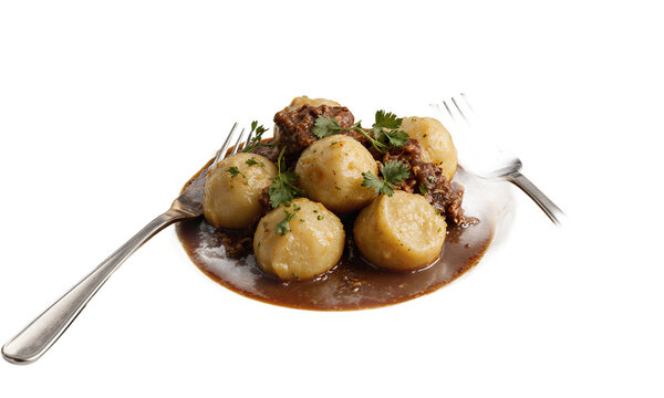 Dumplings gravy meatballs served with fresh parsley and silverware on a transparent background for food design