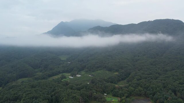 Mist and clouds wrapping around the mountains after the rain_03