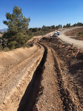 Earthworks for a new road construction trench