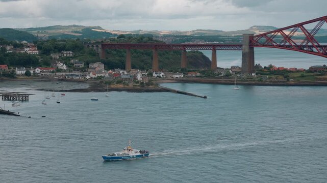 Iconic red Forth Bridge railway viaduct spanning the Firth of Forth in Scotland, UK - 4 September 2026.