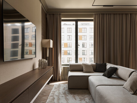 Elegant modern living room with a large window