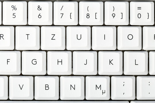 Close view of white German QWERTZ computer keyboard