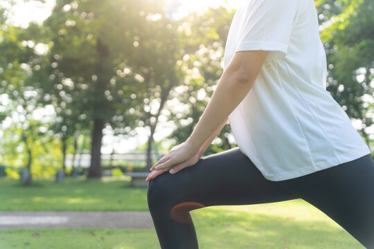 health care female exert on the park. Asian woman doing exercises in morning. balance, recreation, relaxation, calm, good health, happy, relax, healthy lifestyle, reduce stress, peaceful, Attitude.