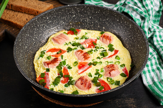 Fresh Omelet Skillet with Vegetables and Herbs