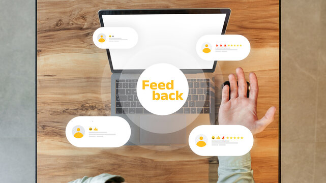 Collection of feedback displayed on a laptop on a wooden table