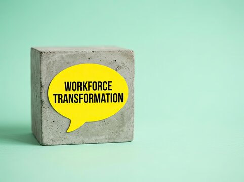 Concrete cube with workforce transformation sticker suitable for HR media symbolizing organizational change skill growth and career adaptation