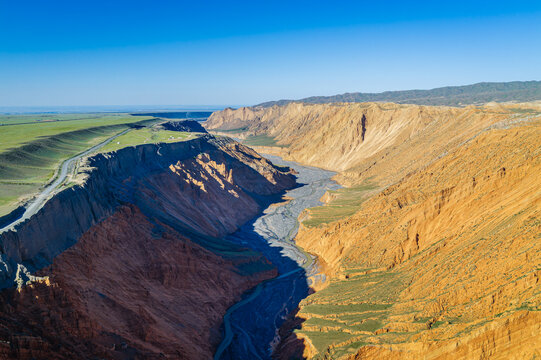 Aerial view of massive eroded cliffs and deep ravines in Anjihai Grand Canyon, Xinjiang, China