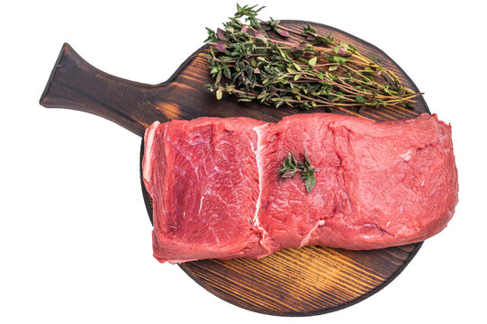 Fresh raw bison meat displayed on a wooden board, showcasing its rich red color and tenderness, ideal for gourmet cooking adventures. isolated on white background. top view