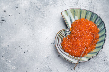 Obraz premium Beautifully presented red roe, a delicacy that enhances every meal with its unique taste and texture. grey background. top view