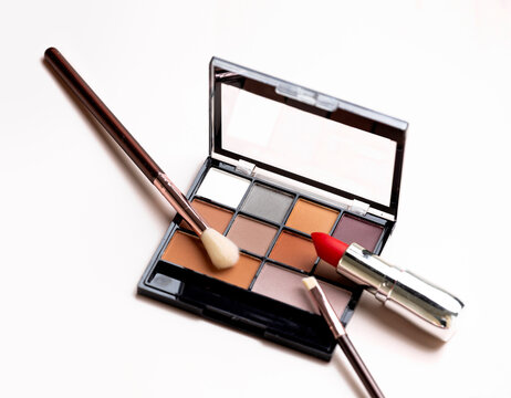 Cosmetics set closeup, makeup items collection, beauty products arrangement closeup empty space background.