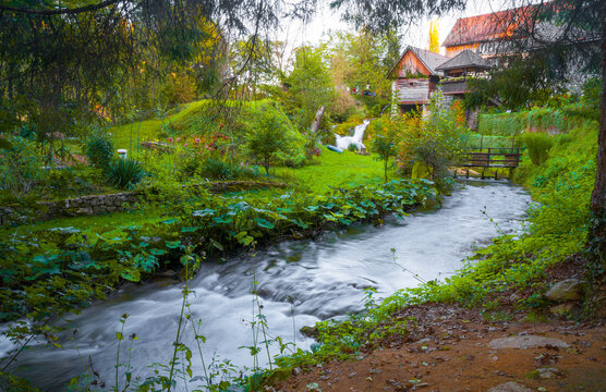 Idyllic stream and wooden watermill houses in fairy tale Rastoke village, Slunj, Croatia