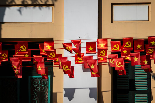 Vietnamese national and Communist Party flags hanging outside