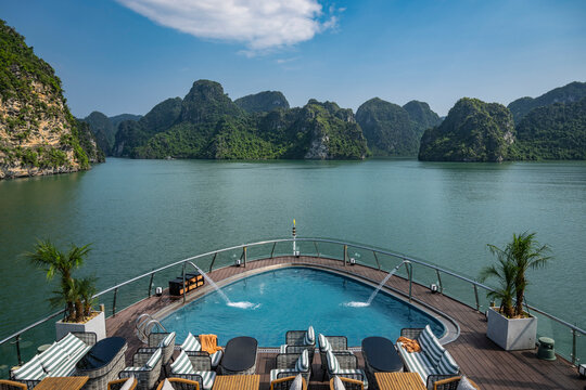 Luxury cruise ship with pool deck in Ha Long Bay Vietnam