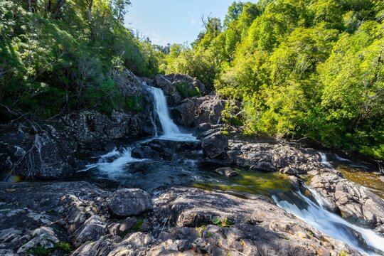 Salto Chaicas waterfall on Rio Chaicas, stream flowing through temperate rainforest, long exposure, Parque Nacional Alerce Andino, Ruta de los Parques, PatAgonia Verde, Llanquihue, Los Lagos, Chile