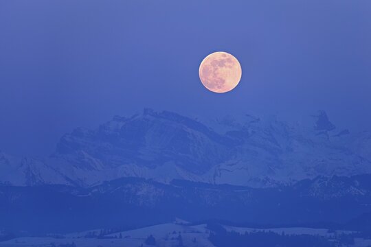 Full moon over the snow-covered Alps, Freiamt, Horben, Lindenberg, Aargau Canton, Switzerland