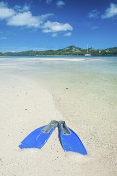 Flippers in the water of the blue lagoon, Yasawas, Fiji, South Pacific