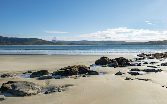 Stones on sandy beach, beach, Porpoise Bay, Catlins, Southland, South Island, New Zealand