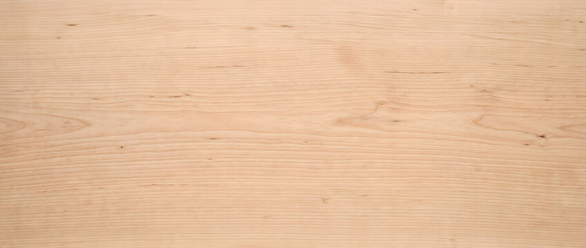 Maple wood texture background showing light pale timber surface with fine natural grain lines for clean minimalist interior design use